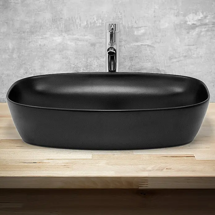 LuxeBath Aufsatzwaschbecken Waschtisch aus Keramik für Badezimmer / Gäste-WC - Ohne Spezialglasur, Schwarz - Elegantes, schwarzes Aufsatzwaschbecken mit schlanker Armatur auf einer hellen Holzplatte. Stilvolles Baddesign.