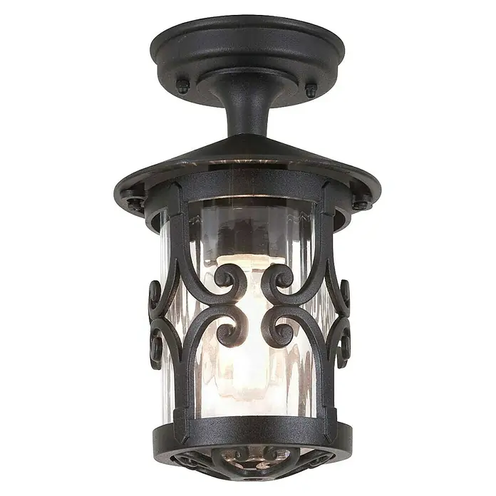 Elstead Außenwandleuchte Hereford - 60 W, 15 x 15 x 26 cm, Schwarz, IP23 - Nahaufnahme einer schwarzen Außenleuchte mit klarem Glas und dekorativen Schmiedeeisendetails.
