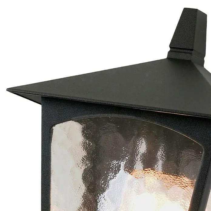 Elstead Außenwandleuchte York - 60 W, 14 x 28 x 28 cm, Schwarz, IP23 - Nahaufnahme einer schwarzen Außenleuchte mit strukturierter Glasscheibe und dekorativem Dach, die eine warme und einladende Atmosphäre schafft.