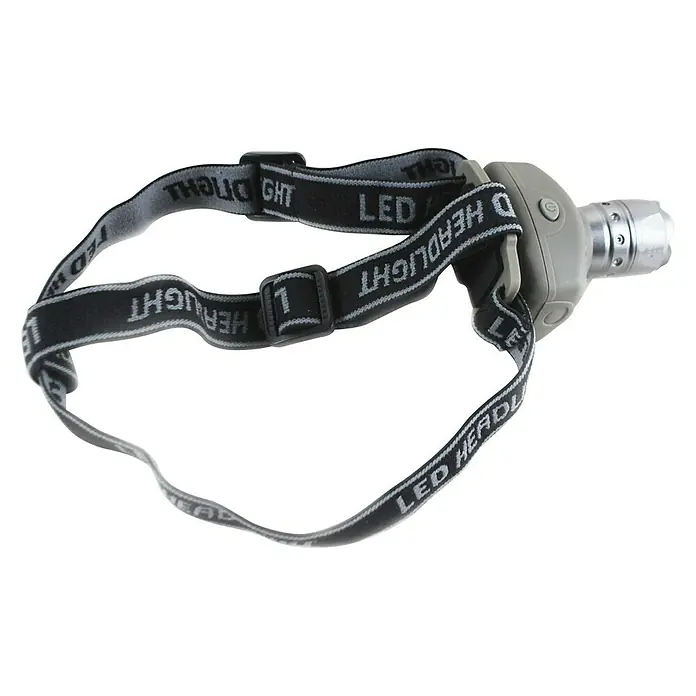 BAUHAUS Linterna frontal - 18 x 12 x 10 cm - La imagen muestra una linterna frontal LED con correas ajustables, perfecta para actividades al aire libre e iluminación manos libres.
