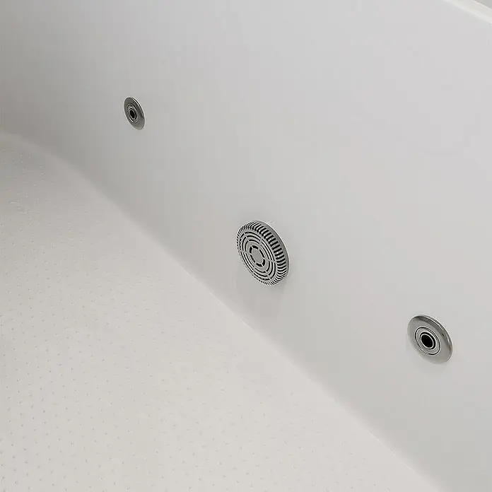 Home Deluxe Badewanne VITAL M - Weiß - Detailaufnahme einer Whirlpool-Badewanne mit Düsen. Die weißen Oberfläche und die Düsen laden zum Entspannen ein.