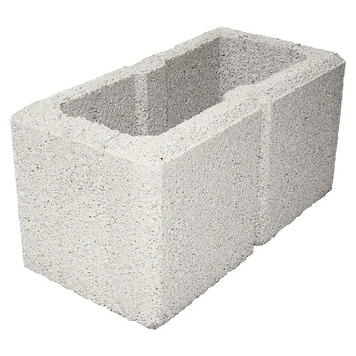 Christoph Gartenmauer Ambienta - 40 x 20 x 20 cm, Weiß, Beton - Nahaufnahme eines grauen Betonhohlblocks, der für Bauprojekte verwendet wird. Seine poröse Textur und hohle Struktur sind deutlich sichtbar.