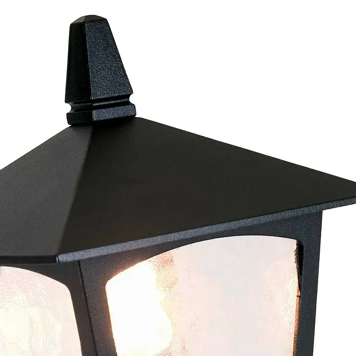 Elstead Außensockelleuchte York - 50 W, Farbe Gehäuse: Schwarz, 18,5 x 18,5 x 41 cm, Ohne Leuchtmittel - Nahaufnahme einer schwarzen Außenleuchte mit dekorativem Aufsatz und strukturiertem Glas. Das Licht sorgt für eine warme Atmosphäre.