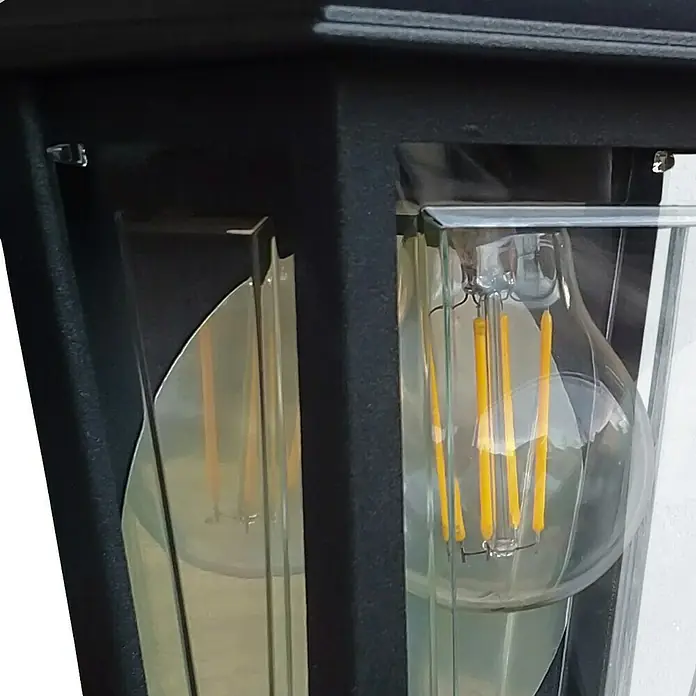 Elstead Außenwandleuchte Deco lane - 60 W, 11 x 32,5 x 32,5 cm, Schwarz, IP44 - Nahaufnahme einer schwarzen Außenleuchte mit klarem Glas und einer dekorativen Glühbirne.