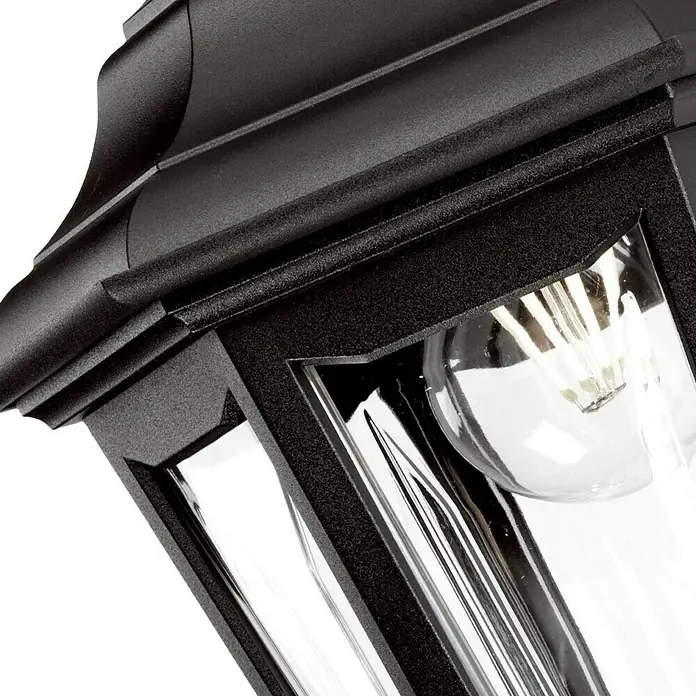Elstead Außenwandleuchte Kinsale - 60 W, 27 x 46 x 46 cm, Schwarz, IP44 - Nahaufnahme einer schwarzen Außenleuchte mit klaren Glasscheiben, die eine helle Glühbirne zeigt. Elegantes Design für den Außenbereich.