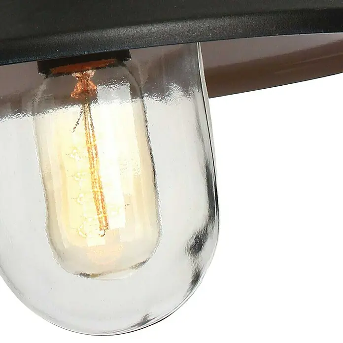 Elstead Pendelleuchte Klampenborg - 60 W, L x B x H: 27,5 x 27,5 x 36 cm, Schwarz, E27 - Nahaufnahme einer Edison-Glühbirne in einer klaren Glasfassung, die ein warmes Licht ausstrahlt und eine Vintage-Atmosphäre erzeugt.