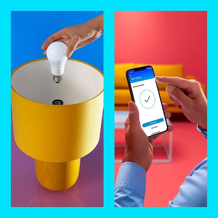 Philips Wiz Smart-LED-Lampe matter - E27, Dimmbar, Neutralweiß, 1.055 lm, 11 W, 1 Stk. - Smartes WiZ LED-Leuchtmittel wird in eine gelbe Lampe eingesetzt & per App verbunden.