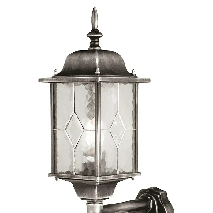 Elstead Außenwandleuchte Wexford - 60 W, 32 x 41 x 41 cm, Schwarz/Silber, IP44 - Nahaufnahme einer rustikalen Außenleuchte aus Metall mit strukturiertem Glas, die einen warmen Schein wirft.