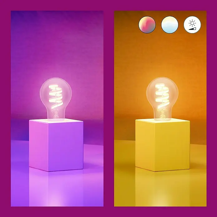 Philips Wiz Smart-LED-Lampe - E27, Dimmbar, RGBW, 470 lm, 6,3 W, 1 Stk., A60 - Würfelförmige Tischleuchte mit anpassbarer LED-Glühbirne, die verschiedene Farben und Helligkeiten bietet, perfekt für modernes Ambiente.