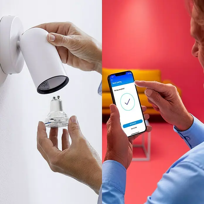Philips Wiz Smart-LED-Lampe - GU10, Dimmbar, Mehrfarbig, 400 lm, 5 W, 1 Stk. - Intelligente Glühbirne wird in einer Halterung installiert und über eine Smartphone-App gekoppelt.