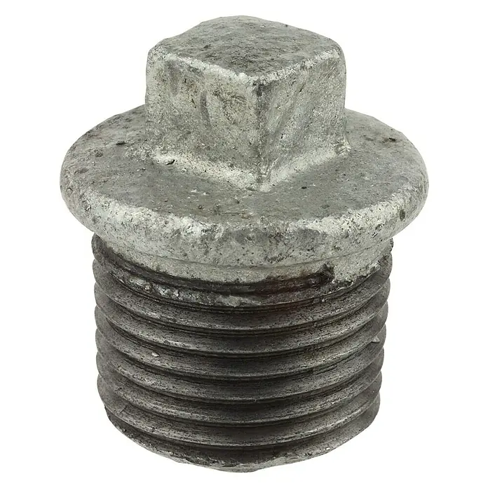 Stopfen - 1″, Verzinkt - Nahaufnahme eines metallischen, quadratischen Stopfens mit Gewinde, der für verschiedene industrielle Anwendungen geeignet ist.