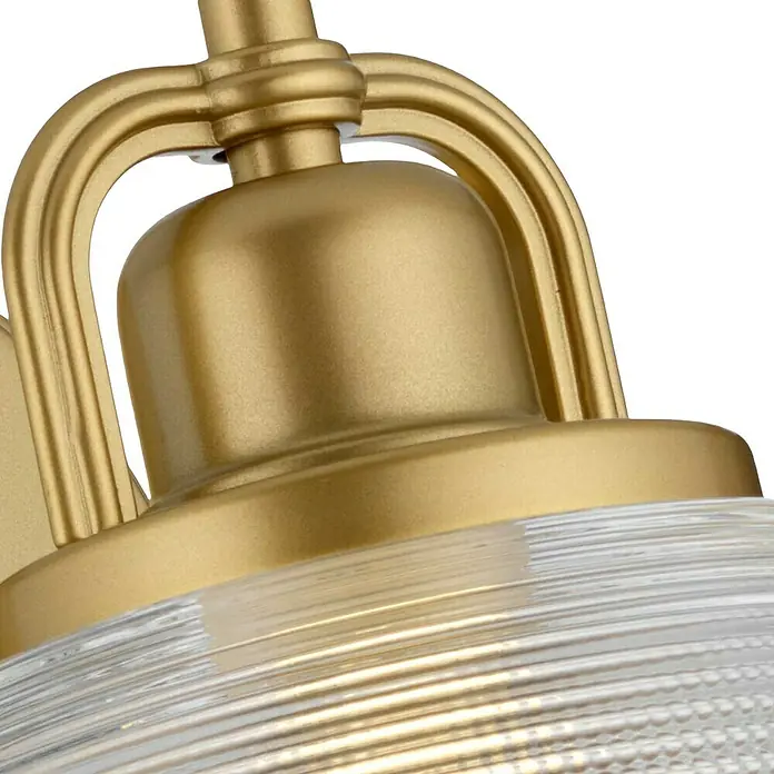 Elstead LED-Wandleuchte Dublin - 3 W, L x B x H: 20 x 16,5 x 24,6 cm, Messing - Detailaufnahme einer goldenen Lampe mit klarem, geriffeltem Glasschirm. Elegantes Design für stilvolle Beleuchtung im Innenbereich.