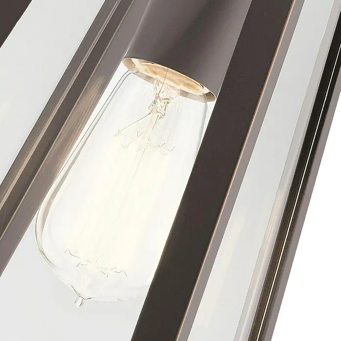 Elstead Außenwandleuchte Delison - 60 W, 25,4 x 35,7 x 35,7 cm, Schwarz, IP44 - Detailaufnahme einer eleganten Pendelleuchte mit einer länglichen Glühbirne und einem bronzefarbenen Metallrahmen.