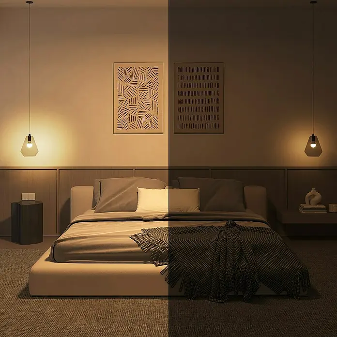 Philips Hue Smart-LED-Lampe Set Essential mit Dimmcontroller, Steuerzentrale - 8 W, RGBW, 806 lm, 1 Stk. - Bettzimmer mit zwei Hängelampen und passender Einrichtung, die eine gemütliche Atmosphäre durch warmes Licht vermitteln.
