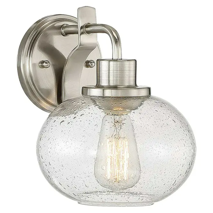 Elstead Wandleuchte Trilogy - 60 W, L x B x H: 22,5 x 19,9 x 24,1 cm, Nickel, E27 - Nahaufnahme einer stilvollen Wandleuchte mit einer klaren Glaskugel und einem Edison-Leuchtmittel, ideal für eine moderne Raumgestaltung.