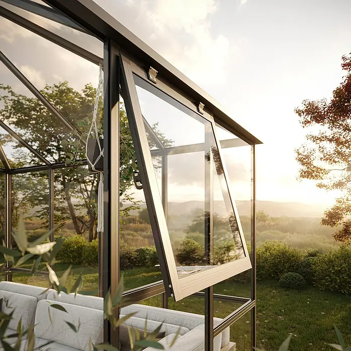 KGT Gewächshaus PaviLux 3,5 - Außenmaß inkl. Dachüberstand (B x T): 350 x 350 cm, 4 mm, Anthrazit-grau, Einscheibensicherheitsglas - Nahaufnahme eines Gewächshauses mit offenem Fenster, das einen Blick auf die Landschaft bietet. Entspannungsoase mit Stil.