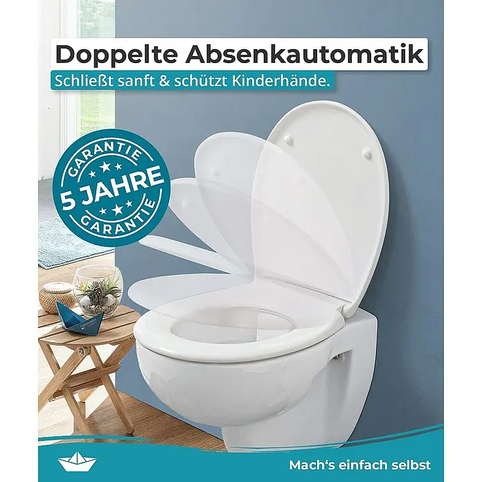 Calmwaters WC-Sitz Motiv Animal Print - Duroplast, Mehrfarbig, Mit Absenkautomatik - Eine Nahaufnahme einer weißen Toilette mit Absenkautomatik und 5 Jahren Garantie, die sanft schließt und Kinderhände schützt.