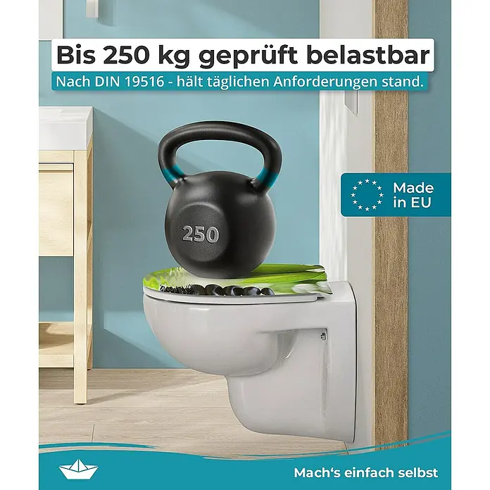 Calmwaters WC-Sitz Motiv Wellness Oase - Duroplast, Mehrfarbig, Mit Absenkautomatik - Werbebild für eine robuste Toilette, die mit einem 250-kg-Gewicht belastet wird, um ihre Stabilität zu demonstrieren.