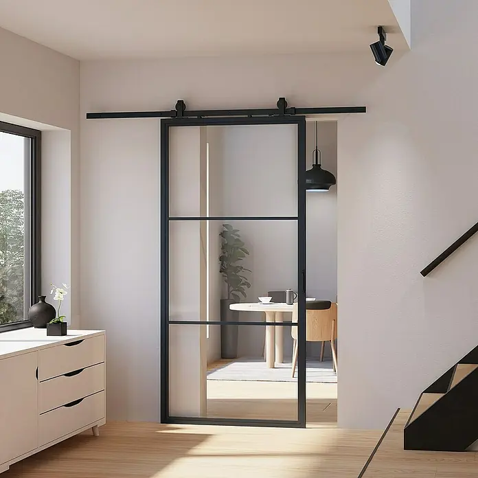 Inova Glasschiebetür Stahl Loft Klarglas Komplettset 3 Felder schwarz inkl. Softclose - Klarglas - Schiebetür aus Glas und schwarzem Metallrahmen, die einen modernen und offenen Übergang zwischen Räumen schafft.