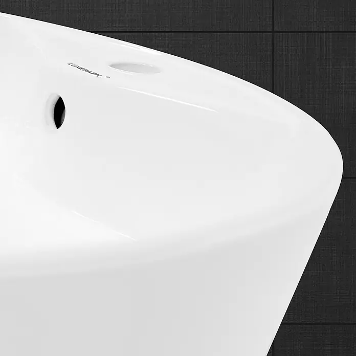 LuxeBath Aufsatzwaschbecken Handwaschbecken aus Keramik Waschtisch für Badezimmer und Gäste-WC - Ohne Spezialglasur, Weiß - Nahaufnahme eines LUXE BATH Waschbeckens in Weiß vor dunklem Hintergrund. Das elegante Design des Waschbeckens sticht hervor.