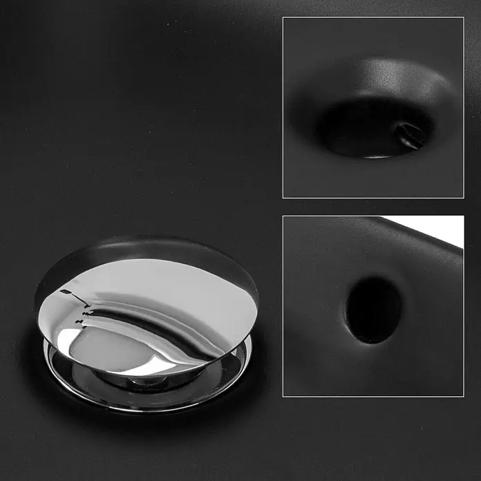 LuxeBath Aufsatzwaschbecken Waschtisch aus Keramik für Badezimmer / Gäste-WC - Ohne Spezialglasur, Schwarz - Ein glänzender, runder Abflussstöpsel mit Details in Nahaufnahme auf einer dunklen Oberfläche. Elegantes Baddesign mit funktionalen Elementen.