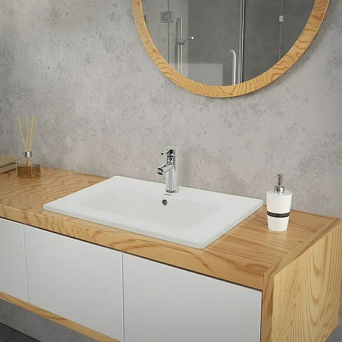 LuxeBath Einbauwaschbecken 610x465x175 mm mit Chrom Ablaufgarnitur - Mit Überlauf, Weiß - Ein Waschbecken mit Holzunterschrank und einem runden Spiegel darüber. Der Waschtisch bietet eine moderne und stilvolle Badezimmerlösung.