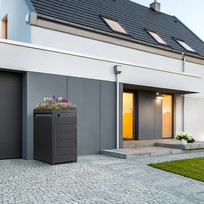 ML-Design Mülltonnenbox 1er 240L mit Pflanzdach und Magnetverschluss 68x80x124 cm Anthrazit - Stahl, Anthrazit, Geeignet für Anzahl Mülltonnen: 1 Stk. - Ein stilvoller Mülltonnenbox mit integriertem Pflanzkasten vor einem modernen Haus.