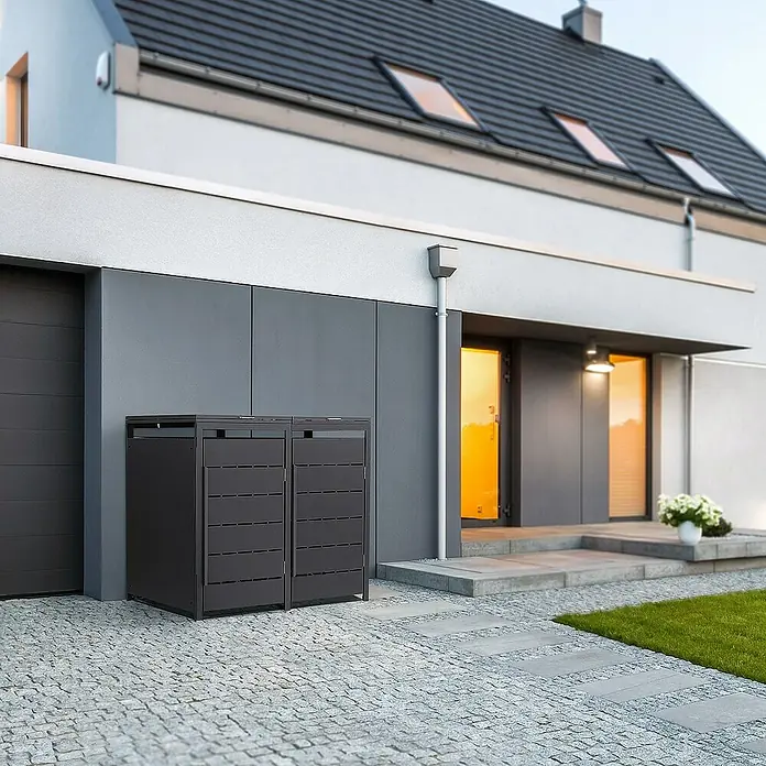 ML-Design Mülltonnenbox 2er 240L mit Klappdeckel und Magnetverschluss 132x80x120 cm Anthrazit - Stahl, Anthrazit, Geeignet für Anzahl Mülltonnen: 2 Stk. - Eine moderne Mülltonnenbox in Anthrazit steht vor einem stilvollen Haus und bietet eine ästhetische Lösung für die Müllentsorgung.