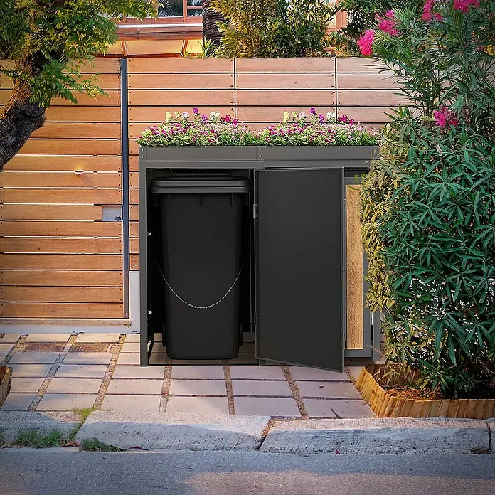 ML-Design Mülltonnenbox Mülltonnencontainer mit Pflanzdach für 2 Tonnen 120 oder 240 Liter - Stahl, Eiche hell, Geeignet für Anzahl Mülltonnen: 2 Stk. - Mülltonnenbox mit Pflanzen auf der Oberseite und einer Mülltonne im Inneren, die durch eine Kette gesichert ist.