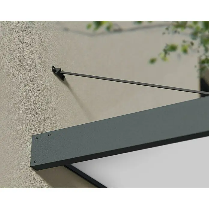 Palram – Canopia Pultvordach Sophia XL - 750 x 140 x 17 cm, Anthrazitgrau, Farbe Dach: Opal - Detailansicht einer modernen, grauen Markise, die an einer Wand befestigt ist, mit einem minimalistischen Design und klaren Linien.