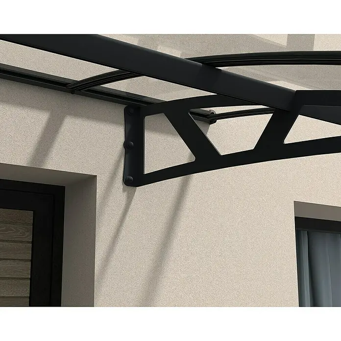 Palram – Canopia Pultvordach Amsterdam - 892 x 139 x 33 cm, Anthrazitgrau - Nahaufnahme eines schwarzen Vordachs mit klarem Dach und dekorativen Stützbalken an einer hellen Wand.