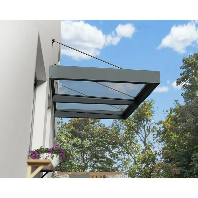 Palram – Canopia Pultvordach Sophia XL - 192 x 140 x 17 cm, Anthrazitgrau, Farbe Dach: Klar - Graue Glasüberdachung mit Stahlträgern, montiert an einer weißen Gebäudefassade. Schützt den Außenbereich vor Witterungseinflüssen.