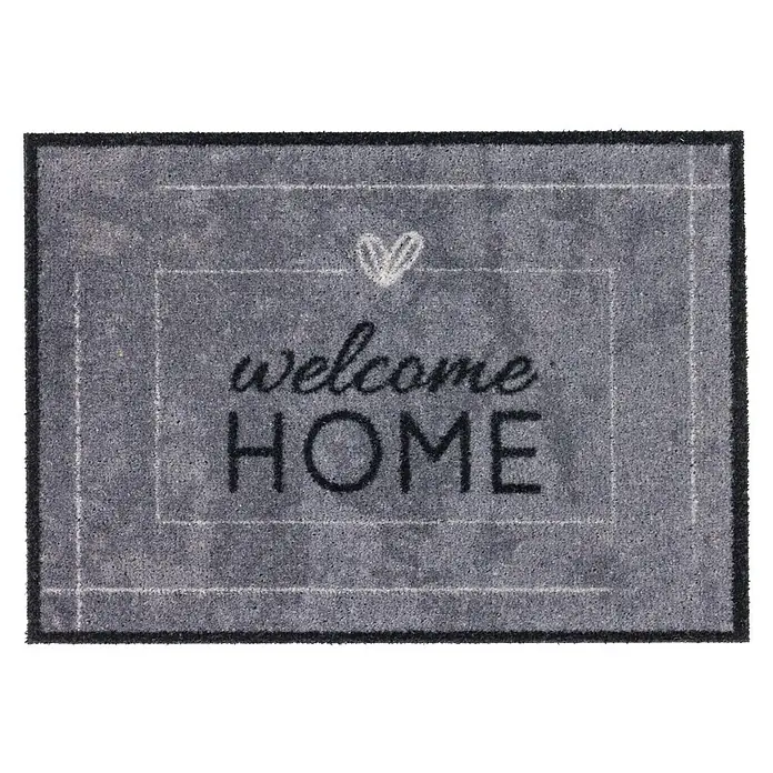Fußmatte Deco Brush - Beton, 70 x 50 cm, 100 % Polyamid - Graue Fußmatte mit der Aufschrift „Welcome Home“ und einem Herz darüber, ideal für den Eingangsbereich. Sie bietet eine einladende Atmosphäre.