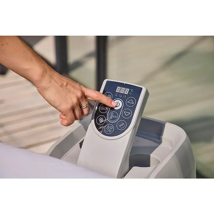 Bestway Lay-Z-Spa Mobil-Whirlpool Copenhagen Hydrojet - L x B x H: 201 x 201 x 80 cm, Grau, 1.050 l - Eine Hand drückt den Power-Knopf auf einem Bedienfeld eines Whirlpools, um die Entspannung zu starten. Komfort und Luxus vereint für Ihr Zuhause.