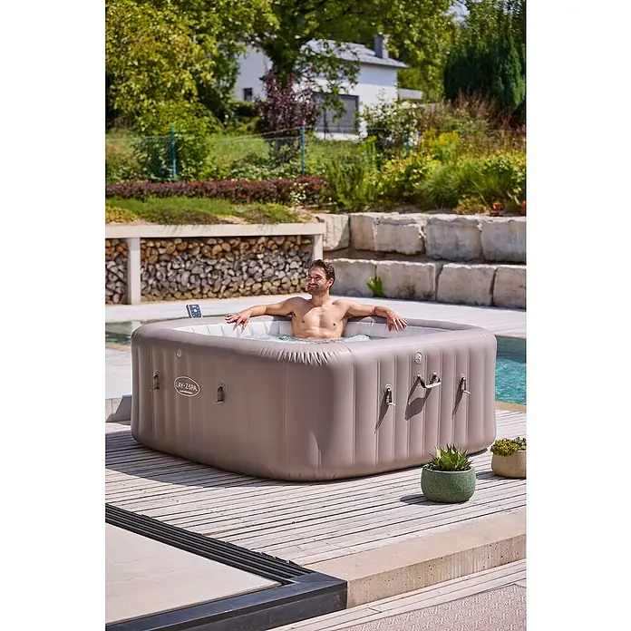 Bestway Lay-Z-Spa Mobil-Whirlpool Copenhagen Hydrojet - L x B x H: 201 x 201 x 80 cm, Grau, 1.050 l - Entspannung pur im Lay-Z-Spa Whirlpool: Ein Mann genießt das warme Wasser im eigenen Garten. Luxus und Wellness für Zuhause!