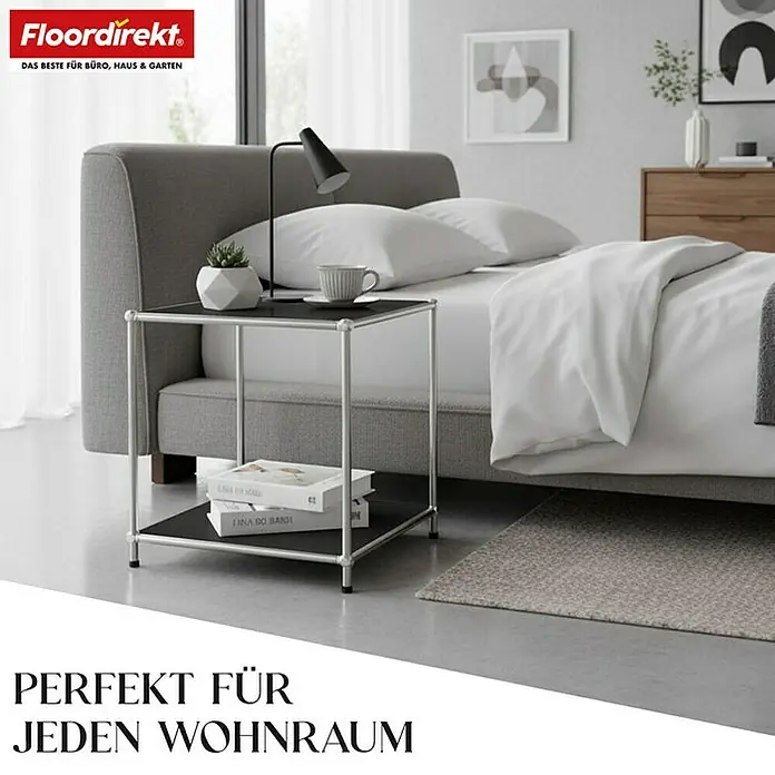 Floordirekt Metallregal Concept Epure MK-012 - 40 x 40 x 46 cm Schwarz - H x B x T: 46 x 40 x 40 cm, Anzahl Böden: 2 Stk., Schrauben, Schwarz - Ein elegantes Bild zeigt einen Nachttisch mit silbernem Rahmen und schwarzen Ablagen neben einem grauem Bett mit weißer Bettwäsche.