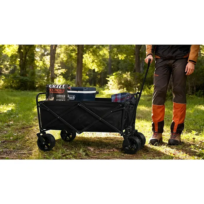 Faltbarer Bollerwagen - L x B x H: 102 x 66 x 76 cm, Belastbarkeit: 60 kg - Der Bollerwagen ist mit Grillkohle, einer Kühlbox und einer Decke beladen und wird von einer Person gezogen. Ideal für Outdoor-Aktivitäten!