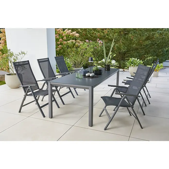 Sunfun Gartenmöbel-Set Maja - 7 -tlg., Aluminium, Textilen, Anthrazit, Night-Grey, Rückenlehne verstellbar - Ein graues Gartentisch-Set mit sechs Stühlen auf einer Terrasse, ideal für Mahlzeiten im Freien.