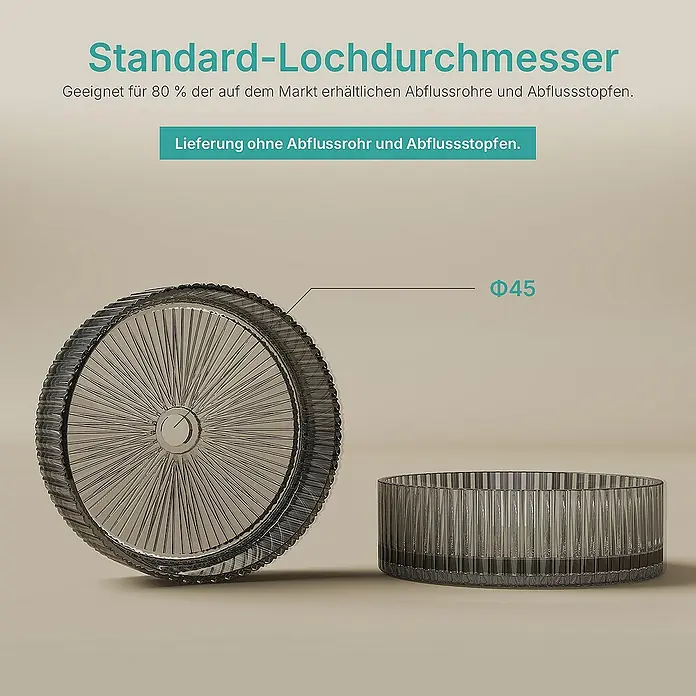 Emke Aufsatzwaschbecken CB32 - 40 x 40 cm, Hahnloch: Ohne, Ohne Überlauf, Schwarz - Das Bild zeigt eine detaillierte Nahaufnahme eines stilvollen, kreisförmigen Abflussfilters aus klarem Kunststoff.