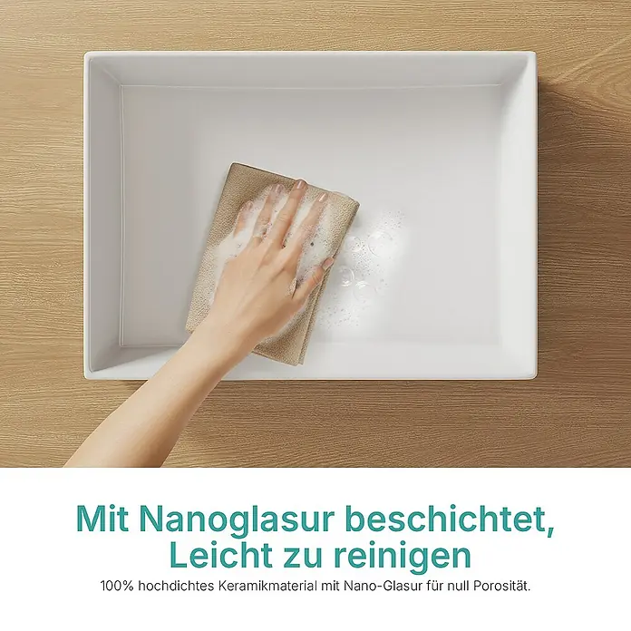 Emke Aufsatzwaschbecken CB29 - 37,3 x 51 cm, Hahnloch: Ohne, Ohne Überlauf, Weiß - Waschbecken mit Nanobeschichtung, leicht zu reinigen, gezeigt mit einem Tuch, das zur Reinigung verwendet wird.