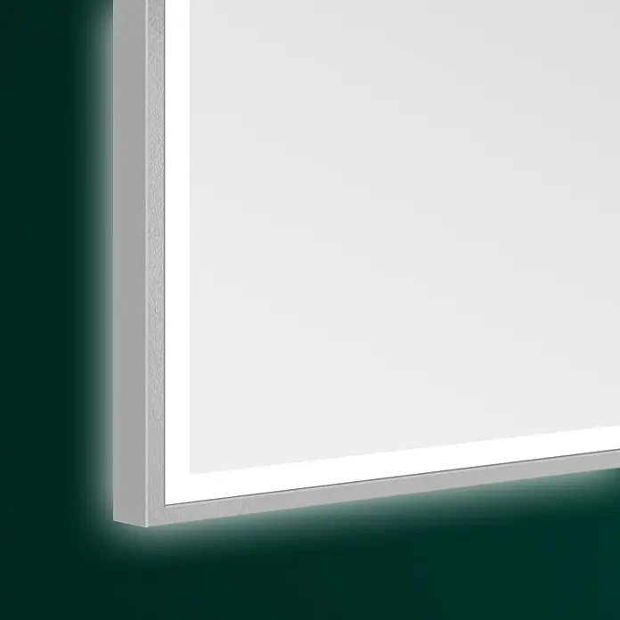 DSK LED-Lichtspiegel Silver Infinity 2.0 - 50 x 70 cm - Nahaufnahme einer modernen, rechteckigen LED-Leuchte mit einem schlanken, weißen Rahmen, die ein sanftes Umgebungslicht ausstrahlt.