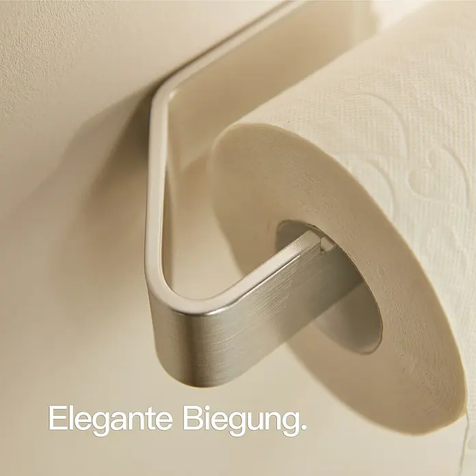 Designfabrik Hamburg Toilettenpapierhalter - Silber gebürstet, Matt - Nahaufnahme eines modernen Toilettenpapierhalters aus gebürstetem Metall mit einer Rolle Toilettenpapier. Stilvolles und funktionales Design.\n