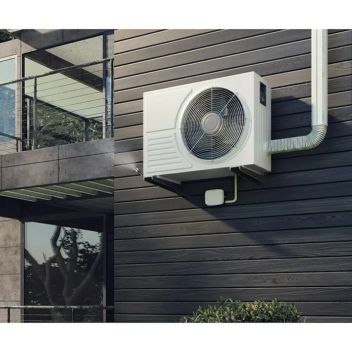 Nebulizador Vaporix Classic - Blanco - Una unidad de aire acondicionado blanca montada en una pared de madera, con una rejilla de ventilador redonda y un tubo de escape que sube.