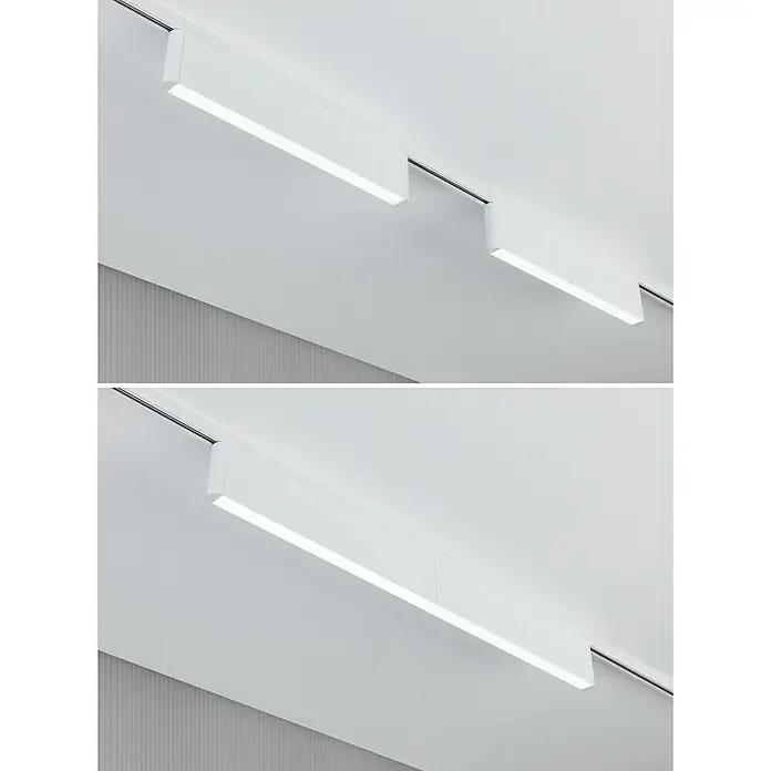 Paulmann URail LED-Pendelleuchte Tyros - 5,5 W, Ø x H: 10 x 10,3 cm, RGBW, Signalweiß - Moderne lineare LED-Schienenleuchten an einer weißen Decke, die ein minimalistisches und helles Designelement darstellen.