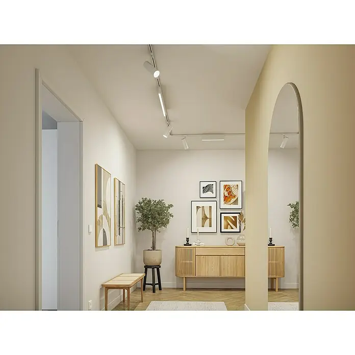Paulmann URail Basis-Set - Signalweiß, Länge: 2,3 m, Metall - Elegante Fluransicht mit moderner Beleuchtung und stilvollen Möbeln. Der Raum wirkt durch die sanften Farben einladend.