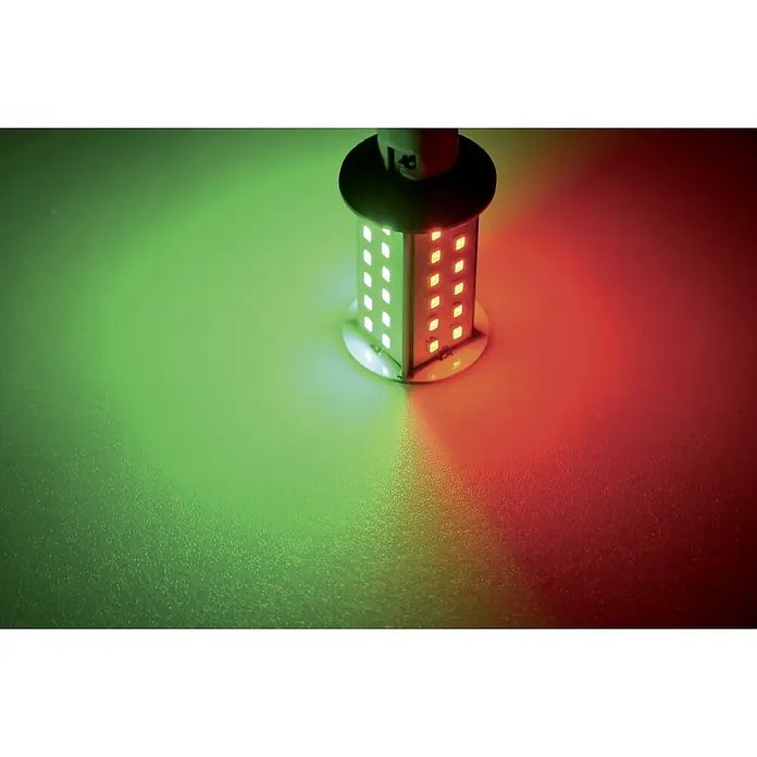 Talamex LED-Navigationsleuchtmittel für Boote - 4,5 W, 10 V - 30 V, Lichtfarbe: Mehrfarbig - Nahaufnahme einer zweifarbigen LED-Navigationslampe, die rotes und grünes Licht ausstrahlt. Die Lampe ist zylindrisch mit einem schwarzen Oberteil.
