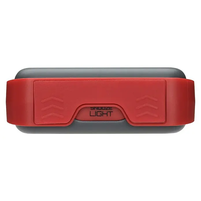 TFA Dostmann Quarzwecker 60.2031.10 lauter Weckton - Digitales Display, Batteriebetrieben, Grau, Rot, 7,9 x 2,8 x 7,4 cm - Nahaufnahme eines Radioweckers mit grauer Basis und roter Taste mit der Aufschrift „Snooze Light“ und nach oben zeigenden Pfeilen.