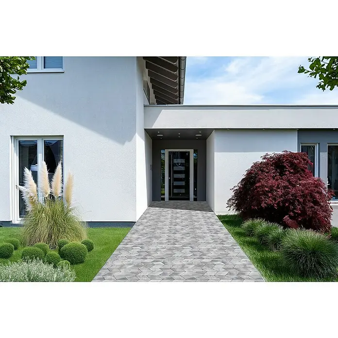 EHL Pflasterstein Plativo - 33,5 x 20 x 8 cm, Weiß-Antrazit, Beton - Ein modernes Haus mit einem gepflasterten Weg zum Hauseingang, umgeben von gepflegten Gärten und Pflanzen. Der Eingangsbereich ist schlicht und einladend.