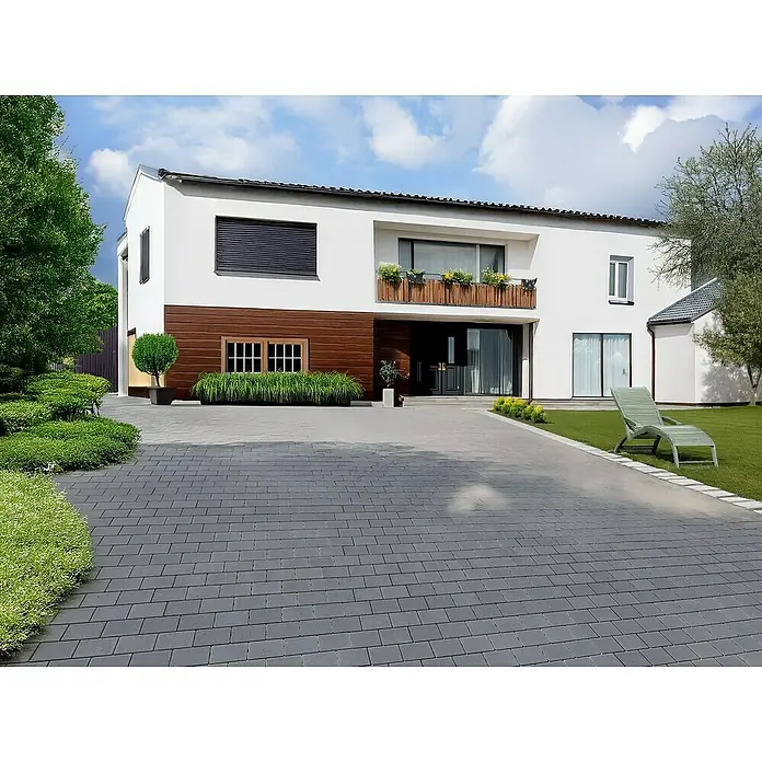 EHL Pflasterstein Ansina Slim - 18 x 12 x 5 cm, Anthrazit, Beton - Ein modernes zweistöckiges Haus mit Holzverkleidung und gepflasterter Auffahrt, umgeben von üppigem Grün. Ideal für stilvolles Wohnen.