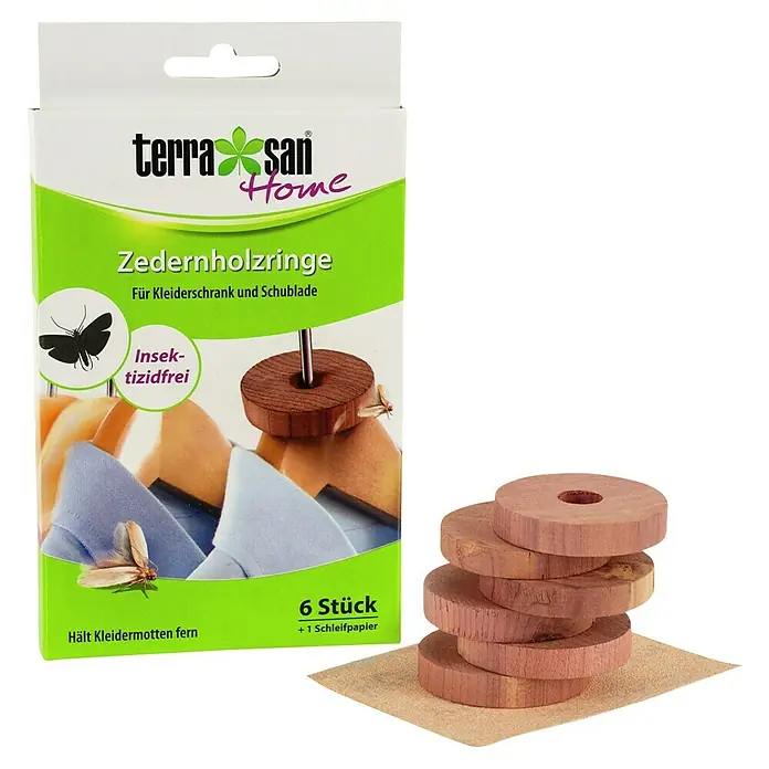 Terrasan Mottenschutz Zedernholzringe - 6 Stk. - Bild einer Packung Zedernholzringe von Terra San Home. Enthält 6 Stück plus Schleifpapier, insektenizidfrei, hält Kleidermotten fern.